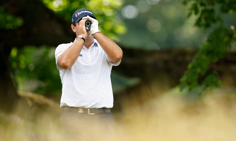 Do professional golfers use rangefinders during tournaments?